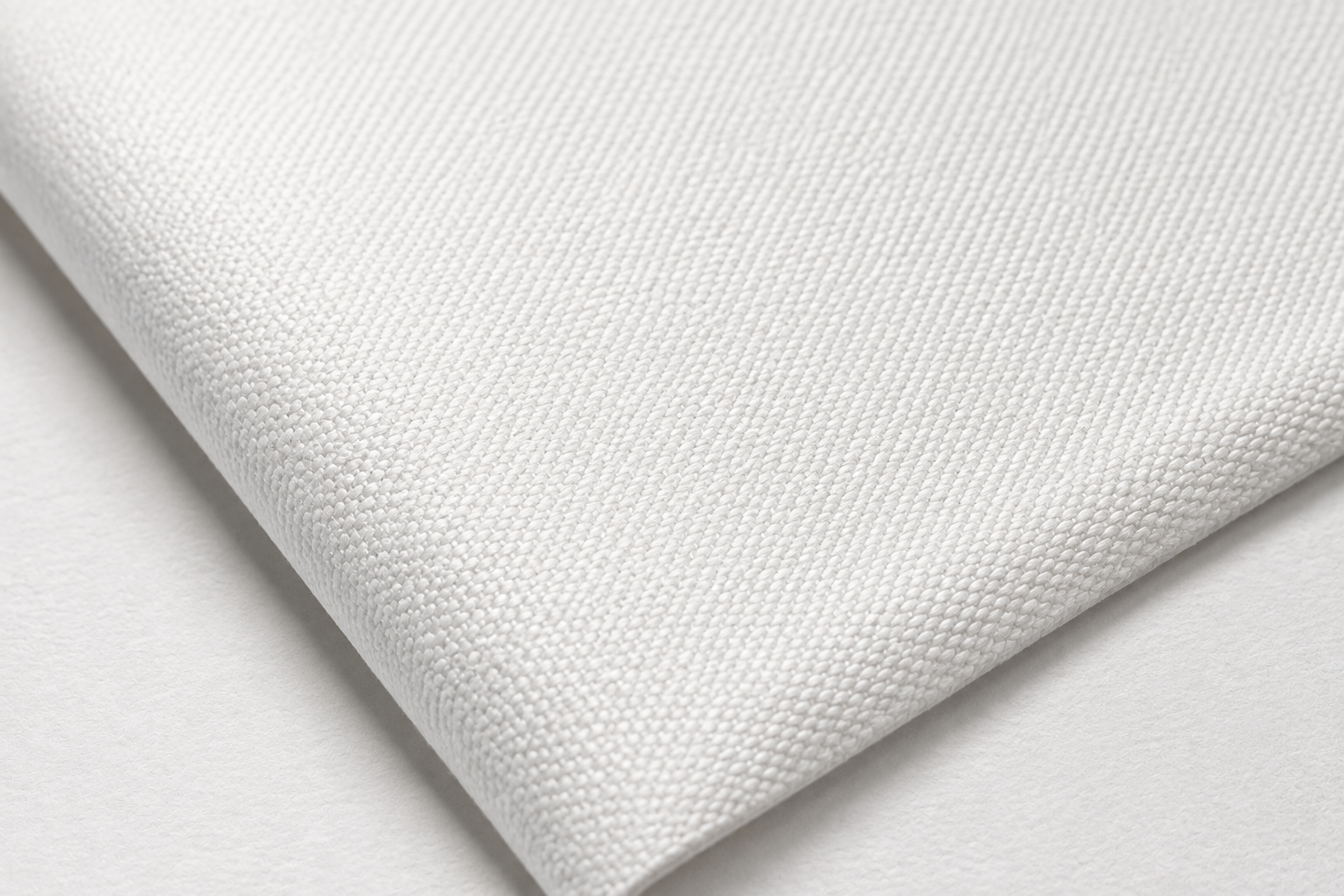 Macro detail of bright white canvas weave