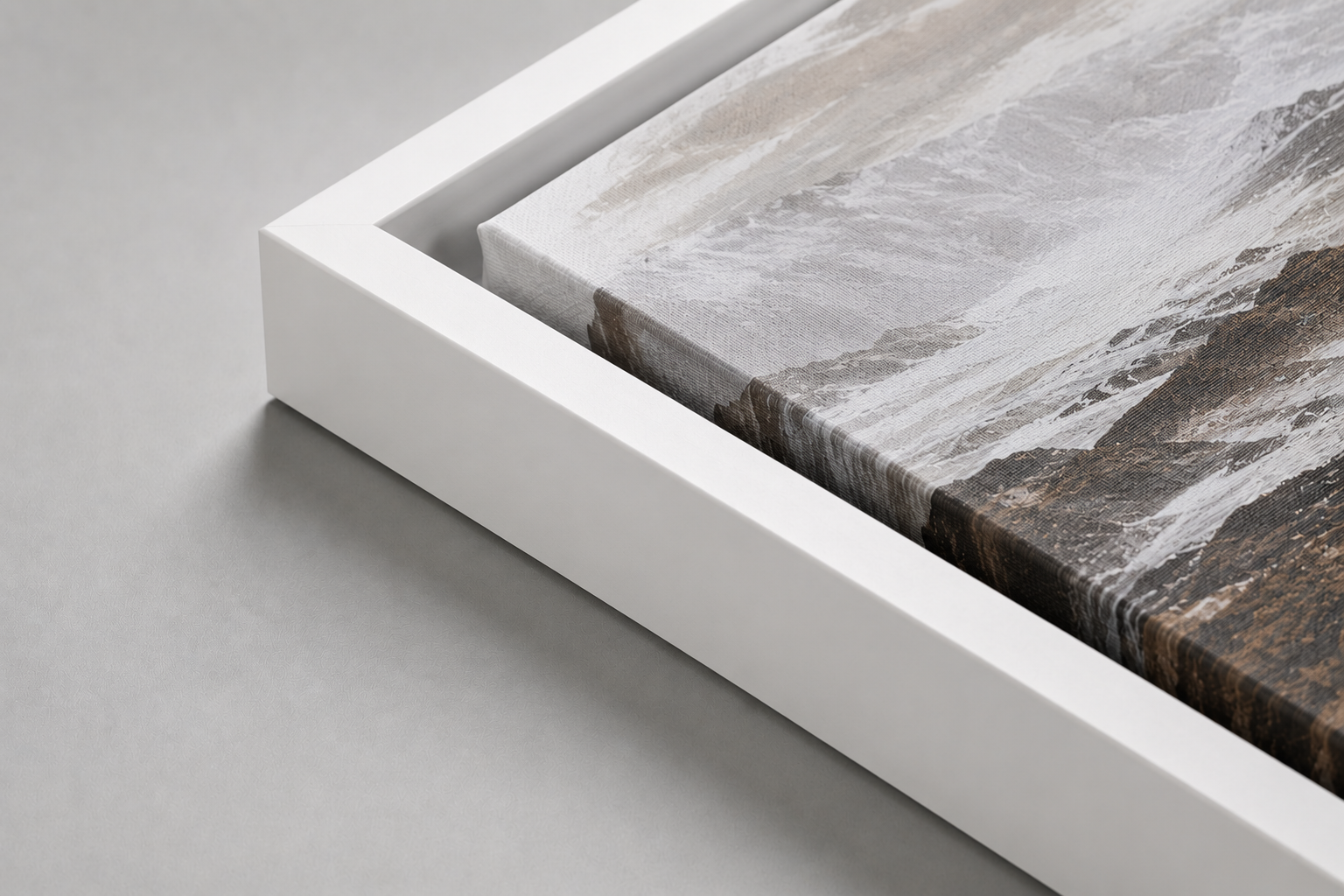 White floater frame corner with canvas set inside