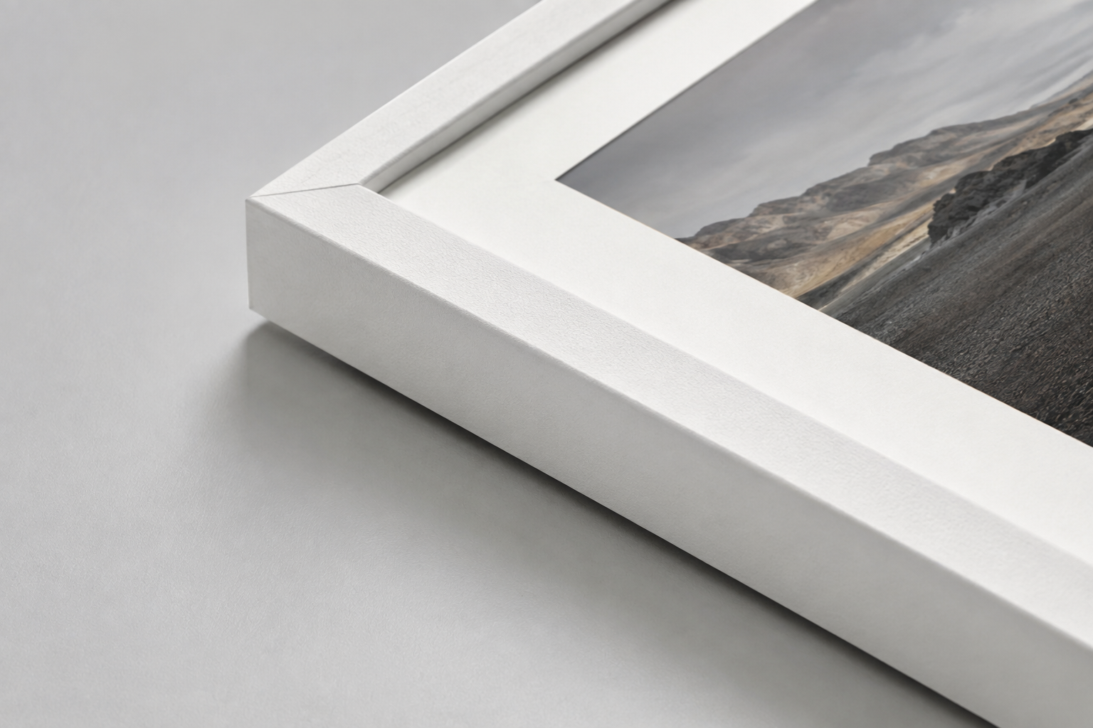 Matte white frame corner with mat and print
