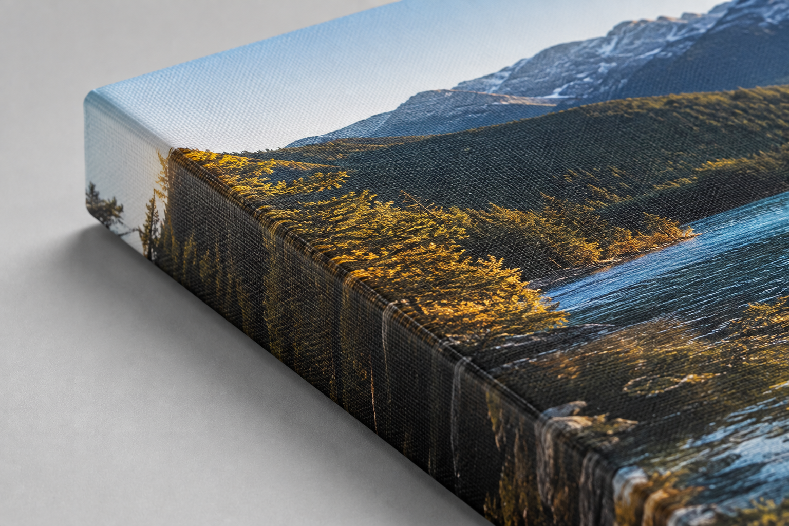 Close-up of a gallery-wrapped canvas edge showing the image continuing around the side